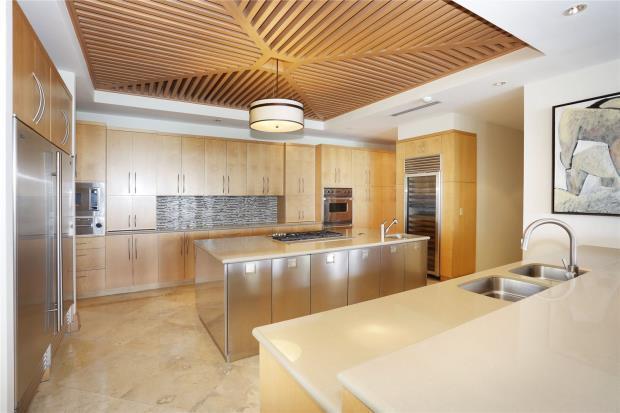 Property highlights include an open plan living room/dining area, office and formal bathroom, as well as a koi pond outside.