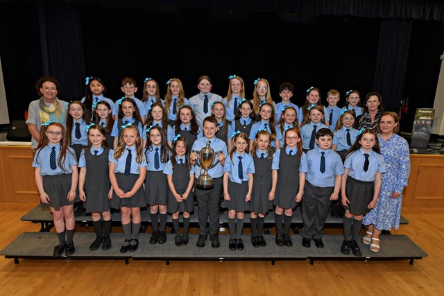 St Anne's Primary School, winners of the Bishop Daly Feis Cup and Bursary at the Feis Dhoire Cholmcille Choral Competitions held in St Mary's College. Included in the photograph (from left) is Mrs Michaela Doherty , Mrs Ellis McGuinness, Principal, and Mrs Nicola Soal. Photo: George Sweeney