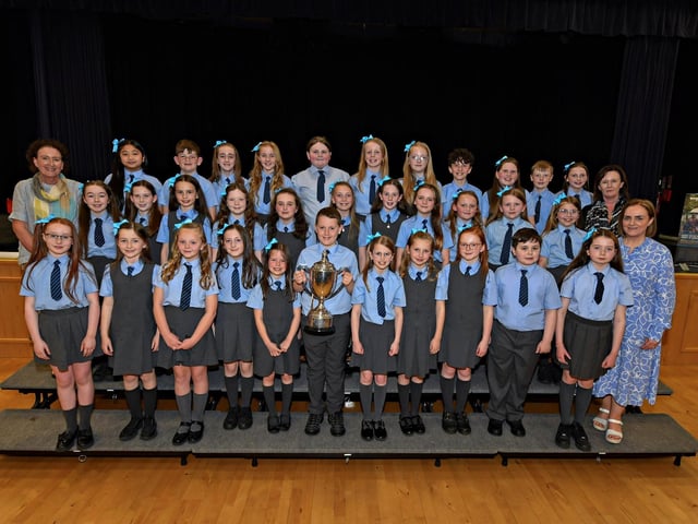 St Anne's Primary School, winners of the Bishop Daly Feis Cup and Bursary at the Feis Dhoire Cholmcille Choral Competitions held in St Mary's College. Included in the photograph (from left) is Mrs Michaela Doherty , Mrs Ellis McGuinness, Principal, and Mrs Nicola Soal. Photo: George Sweeney