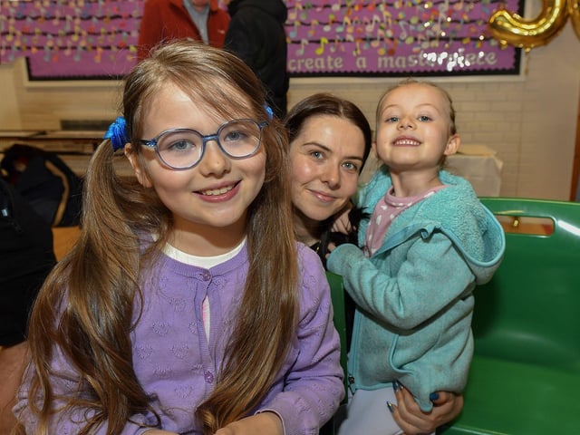 Current pupils Ayla and Zara Harding pictured with their mum Edel at St Oliver Plunkett’s Primary School’s 50th anniversary celebrations on Thursday evening