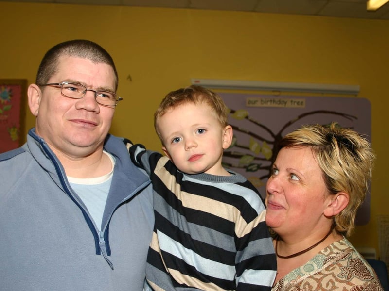 Birthday Boy Fearghal McKinney with mum and dad Christopher and Michelle 5060dd : Parties and celebrations in Derry in April 2005.