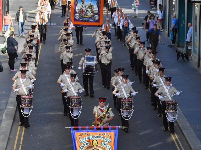 Orangemen take part in the July 12 celebrations in Derry’s city centre on Saturday morning. Photo: George Sweeney