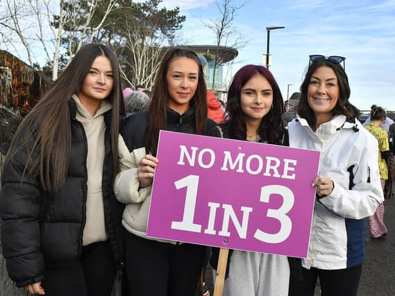 Proponents who participated in the Foyle Women’s Aid walk, from Sainsbury’s to the Guildhall on Sunday afternoon, supporting the United Nations Women’s Campaign to eliminate gender – based violence worldwide. Photo: George Sweeney