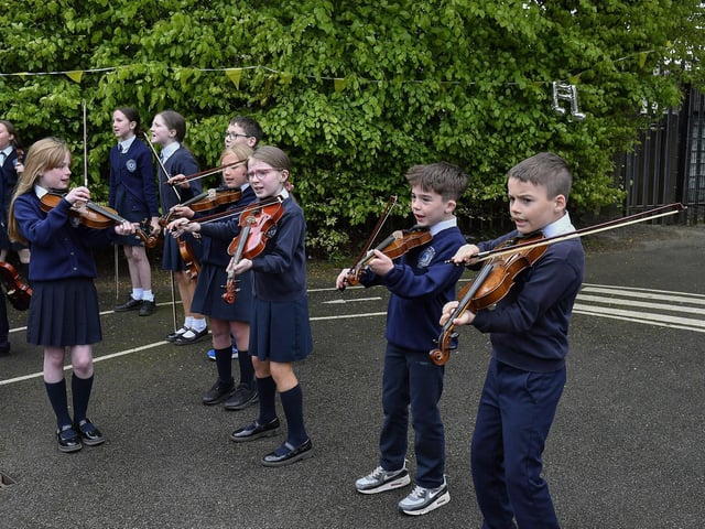 The Rosemount Primary School band performed “The Derry Jazz Song” with the Jive Aces on Thursday morning. Photo: George Sweeney