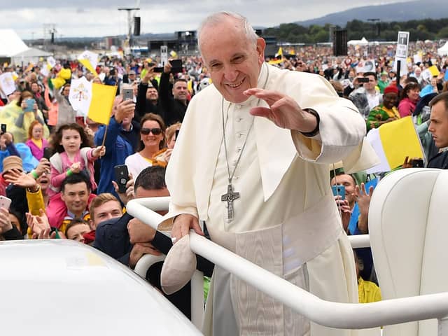 Pope Francis waves to the faithfull as he arrives to lead the Holy Mass at Phoenix Park in Dublin on August 26, 2018, during his visit to Ireland to attend the 2018 World Meeting of Families. (Photo by Ben STANSALL / AFP)        (Photo credit should read BEN STANSALL/AFP via Getty Images)
