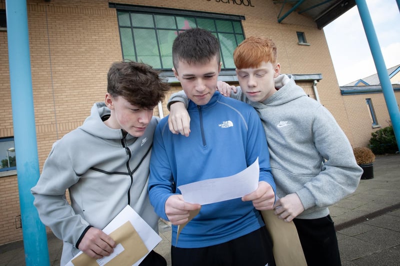 Checking out GCSE results at St. Joseph's Boys' School on Thursday were Shane Moran, Daragh O'Kane and Ethan Devine.