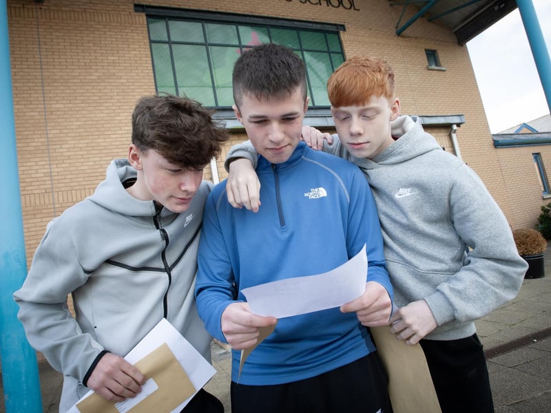 Checking out GCSE results at St. Joseph's Boys' School on Thursday were Shane Moran, Daragh O'Kane and Ethan Devine.