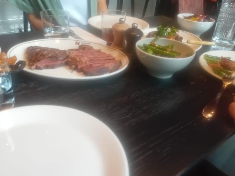 A serving of dry aged Polish rib-eye steak and USA Prime Black Angus rib eye steak from Butchery & Wine in Gdynia.