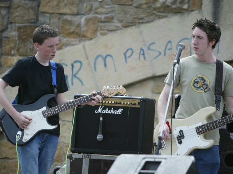 Local musicians from the Suspects perofroming at the SCORE site on Saturday. (0107JB50)