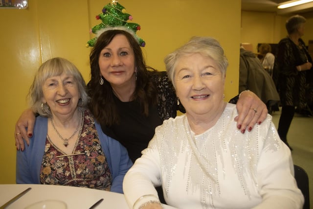 St. Paul's School Secretary Paula Kane with her mum Mary Kane and Loreto Bradley at the St. Paul's PS Annual Christmas Pensioners' Dinner on Friday night.