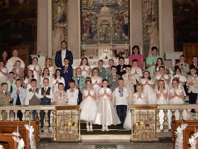Pupils from Long Tower Primary School who received the Sacrament of First Holy Communion from Fr. Gerard Mongan at St. Columba's Church, Long Tower on Friday last. (Photo: Gerry Temple)