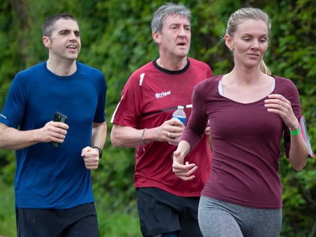 Parents - Messrs Barr, Duffy and Lynch showing real stamina in the final stages of Friday’s Run Challenge for Hollybush PS.
