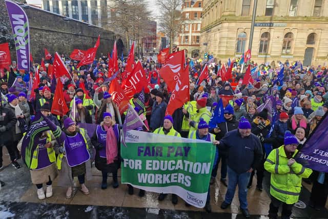 Trade unionists pack Guildhall Square on January 18.