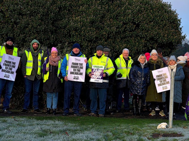 Health and care workers from NIPSA, UNISON and GMB trade unions, campaigning for fair pay and conditions, take part in industrial action at Gransha on Monday morning. Photo: George Sweeney. DER2250GS – 10
