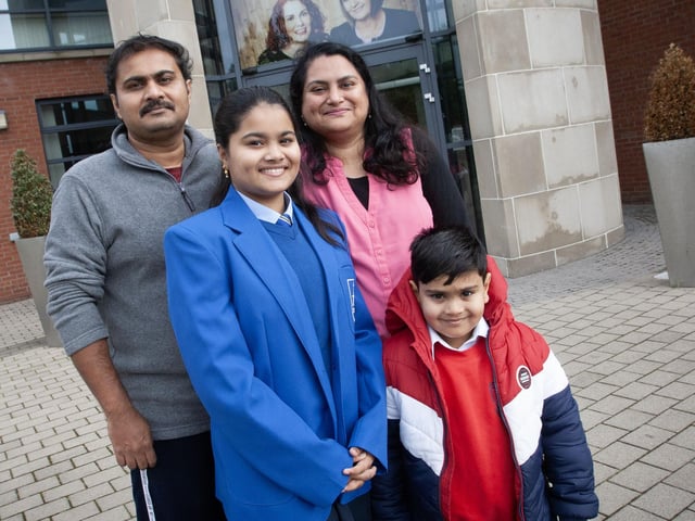 Shresha Ann Mobin, a new Year 8 start at St. Mary's College pictured on her first day at the school on Friday with parents Mobin J. Joseph, dad, Juna Mobin, mum and brother Davin Mobin. 