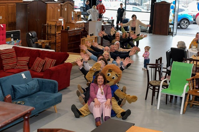 Mayor Patricia, Foyle Hospice staff and visitors, to the new Hospice shop in Pennyburn Industrial Estate, getting some ‘Rock the Boat’ practice for the record attempt to be held on Shipquay Street on Saturday 4th May. Photo: George Sweeney