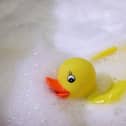 HAMBURG, GERMANY - JANUARY 13: A rubber duck swims in a foam bath in a bath tub on January 13, 2007 in Hamburg, Germany.  (Photo Illustration by Alexander Hassenstein/Getty Images)