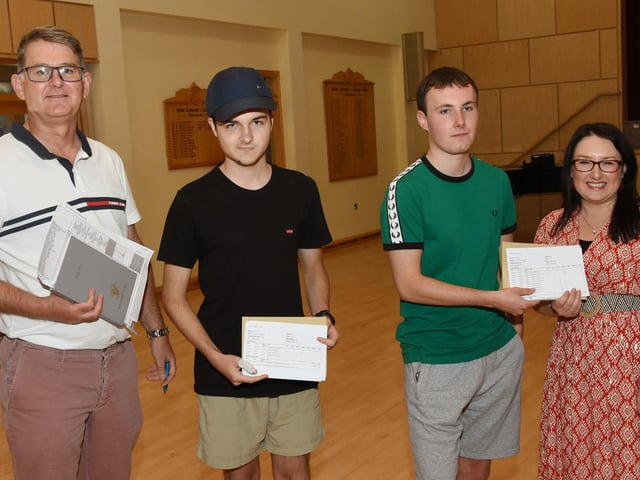 St Columb's College A Level students, Fintan Gallagher and Conor Meehan, pictured with Vice- Principals Brian Keys and Caroline McLaughlin on A Level Results Day 2023.