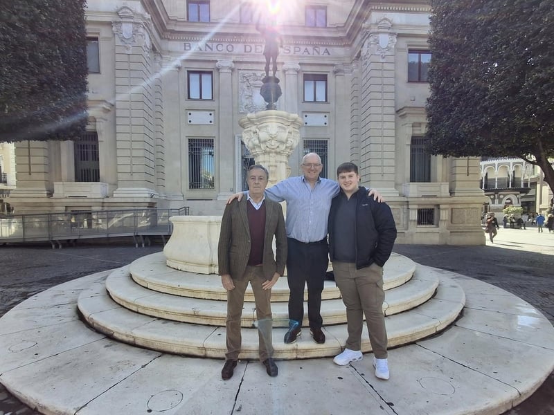 Derry father and son Marcas and Cormac Ó Murchú with Chieftain Ramón Ó Dogherty, head of the Clann Uí Dhochartaigh, in Seville.