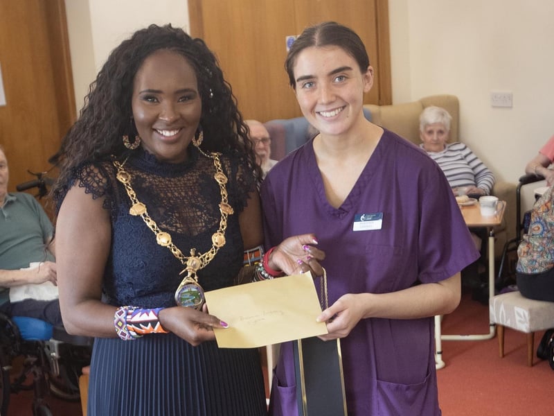 Rheanna Lindsay being presented with an award from the Mayor, Lillian Seenoi-Barr for five years service at Longfield Care Home on Thursday afternoon.