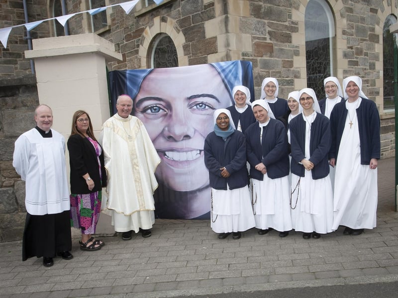 Bishop Donal McKeown, Shauna Crockett and Fr. Gerard Mongan pictured with some of the Carmelite nuns who attended Sunday’s Mass at the Long Tower Church.
