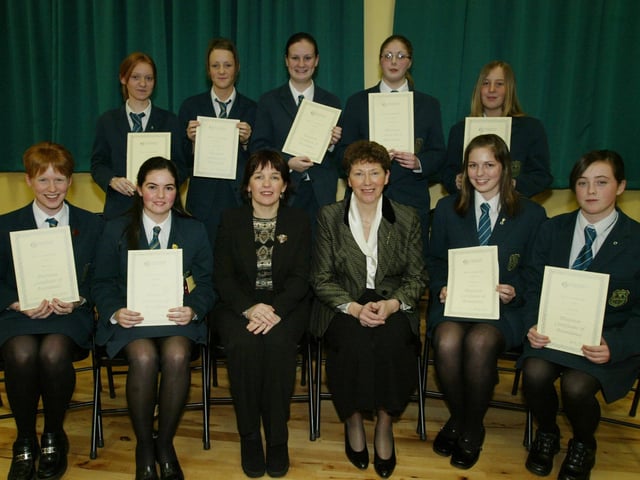 Attendance award recipients pictured with Marian McAlinney (Vice Principal) and Teresa Melaugh (EWO). Included are seated, Lisa O'Kane, Rachel Bradley, Andrea McCallion and Aoife Harvey. Standing are from left, Catherine McAdams, Seaneen Browne, Isobel Burkan, Ciara Bradley and Carolann Ball. (0512JB85):.