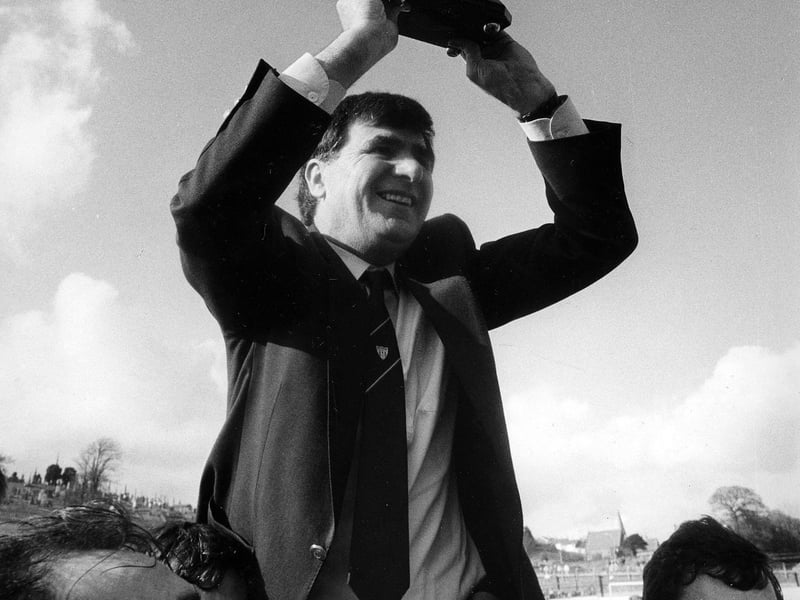 Derry City manager Jim McLaughlin celebrates winning the Premier Division title.