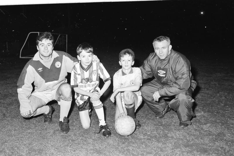 Manchester City winger Michael Hughes and player-manager Peter Reid meet the club mascots.