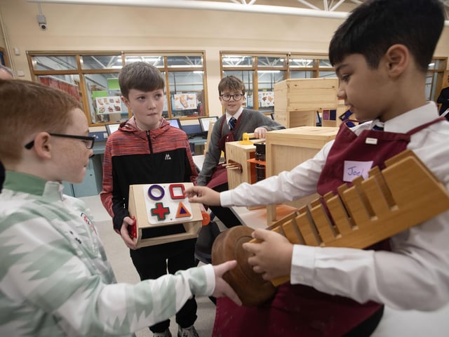 Prospective pupils Robert and Cahair from St. Patrick's Pennyburn pictured on a visit to the TD Department and chatting to Year 8 students Niall and Joel. : .