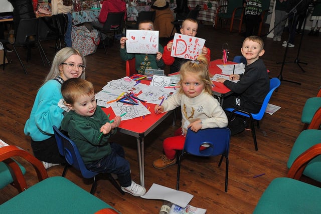 Children enjoy the fun at the Galliagh Community Response Christmas Craft Fair held in Pio House Parish Centre on Saturday, in aid of Foyle Down Syndrome Trust.  Photo: George Sweeney. DER2250GS – 83