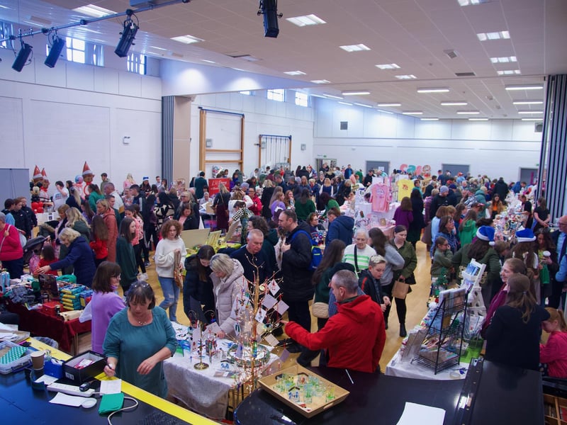 People enjoying the St. Mary's College Christmas Fair.