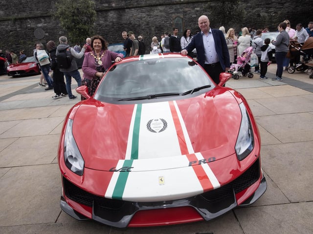 FOUND ONE WE LIKED!. . . .Mayor Patricia Logue and husband James beside one of the attractions at Saturday's Supercar Rally.