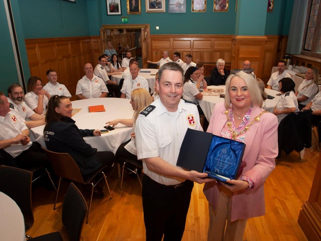 The Mayor, Sandra Duffy making a special presentation to Stephen Twells, Foyle Search and Rescue to mark their 30th anniversary, during a function in the Guildhall on Wednesday evening.