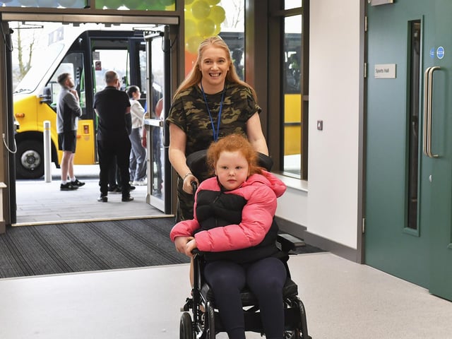 Classroom Assistant Christine Mc Callion with Amy at the newly opened Ardnashee School and College Northland Academy, on Northland Road, on Monday morning.  Photo: George Sweeney