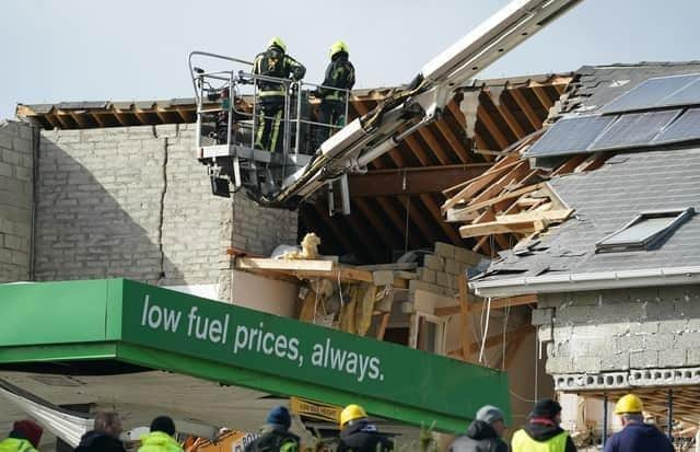 Fire-fighters working at the scene in Creeslough following the explosion.