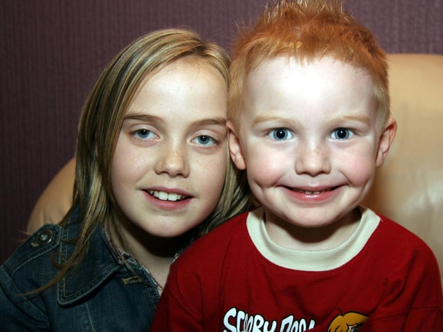 Sarah and cousin Cameron smile for the camera 0033JML : Parties and nights out in Derry and Donegal in February 2006.