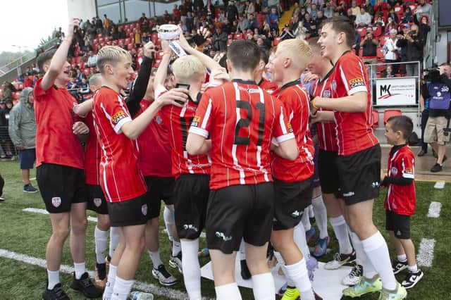 Derry City players celebrate after winning the u-14 Foyle Cup at Brandywell on Saturday afternoon, after beating Ards 6-1. (Photos: Jim McCafferty Photography)