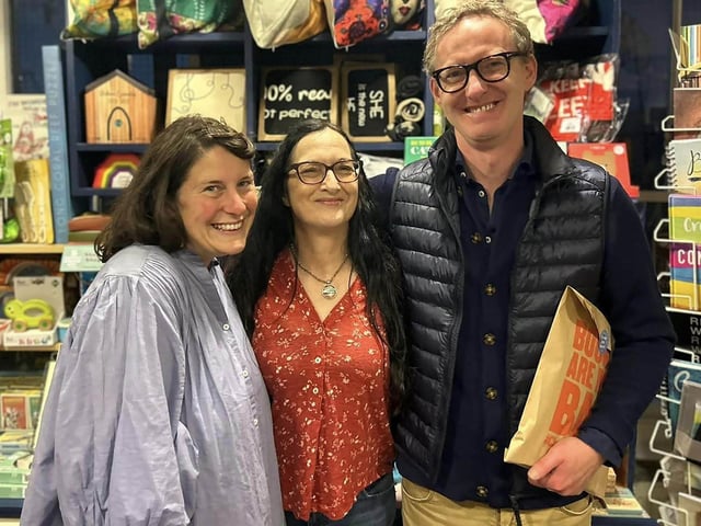Little Acorns Bookstore owner Jenni Doherty pictured with Kerri Ni Dochartaigh and Neil Hegarty on Friday night.