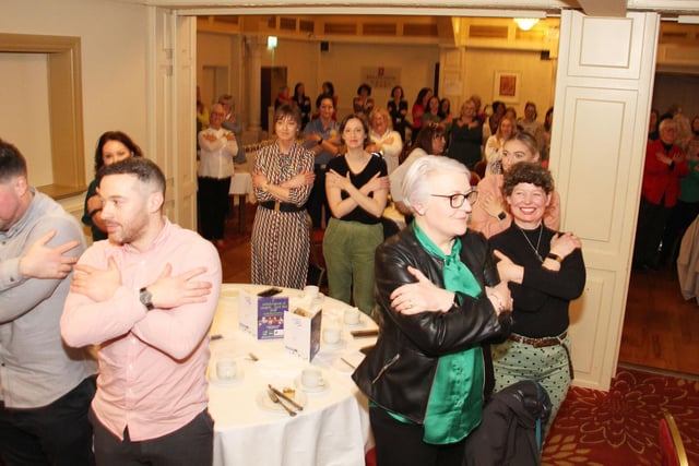 The Embrace Equity pose.