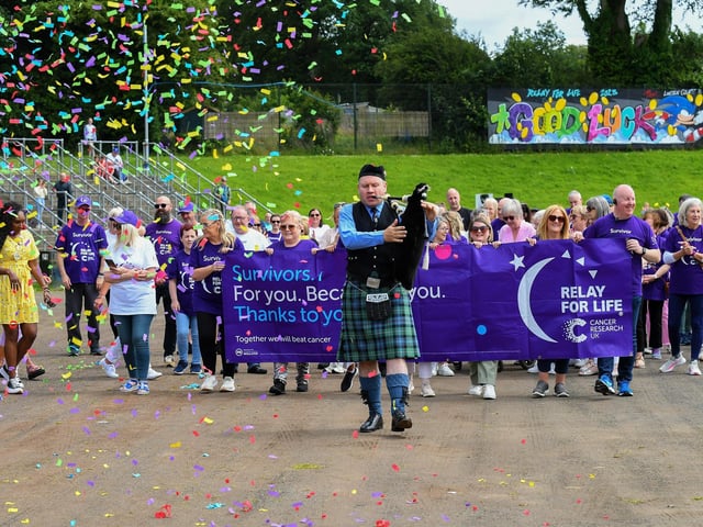 Almost one hundred cancer survivors took part in an inspiring Lap of Honour around St Columb’s running track prior to 40 fund-raising teams beginning the opening laps of the  24 hour Legenderry Relay for Life.  Photo: George Sweeney.