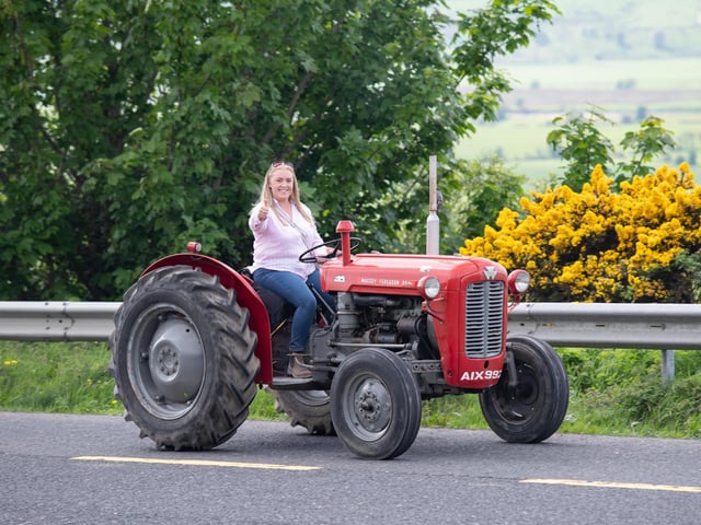 Kelly McBride on the road at the Allen Wylie Memorial Tractor Run from Letterkenny to Newtoncunningham on Saturday last held to raise funds for the Good & New Cancer Bus. Photo Clive Wasson