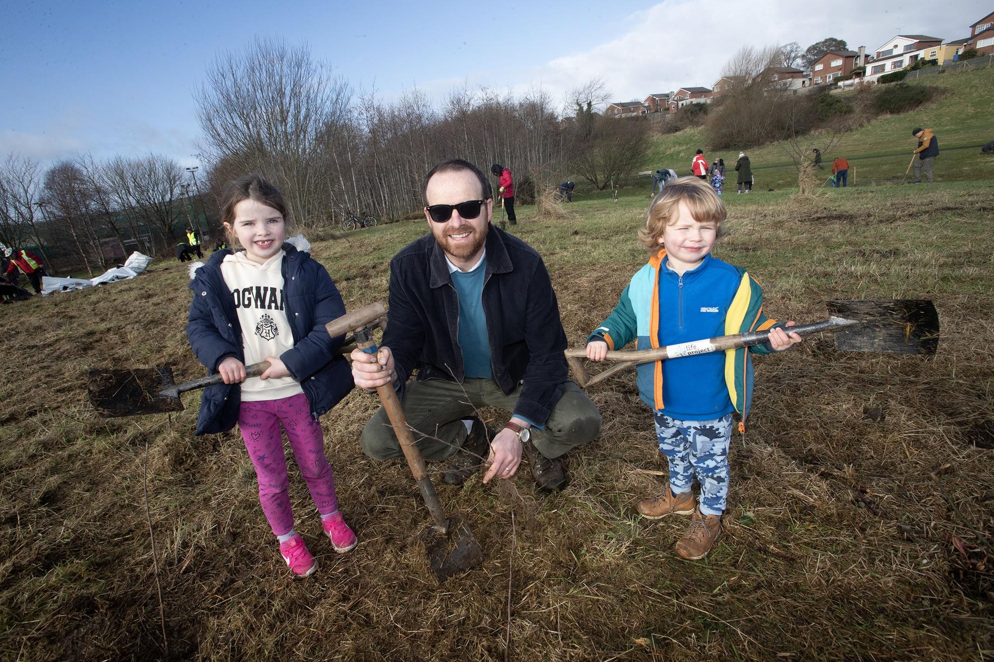 Dad Jonathan Crockett pictured with Nora (6) and Seamus (4) during Saturday's Special Tree Planting at Bay Road.