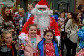 Children and parents gather at Foyleside Shopping Centre on Saturday morning to greet Santa. Photo: George Sweeney.  DER2244GS – 67