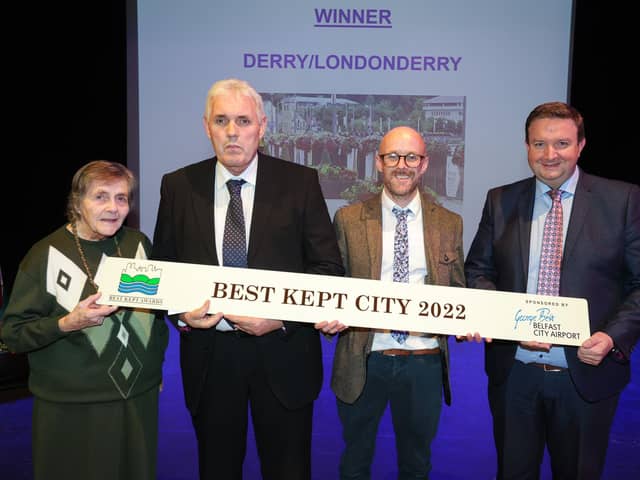 Derry representatives collecting the 'Best Kept City' award.