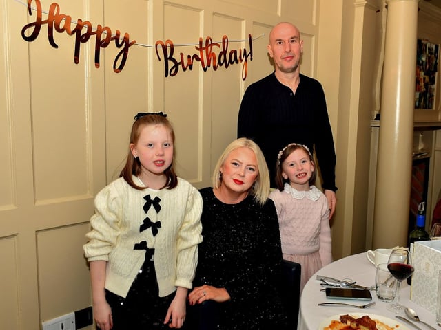 Relatives of Margaret Jackson celebrate her 65th birthday in Bishop’s Gate Hotel. Photo: George Sweeney