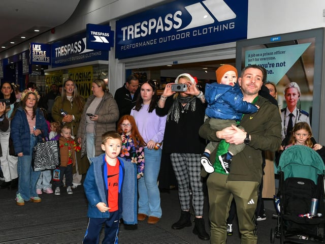 Families await the arrival of Santa at the Richmond Shopping Centre on Saturday morning. Photo: George Sweeney