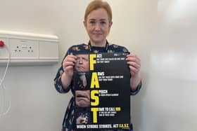 Dr Elizabeth Best, Stroke Speciality Doctor at Altnagelvin Hospital with the FAST poster.
