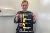 Dr Elizabeth Best, Stroke Speciality Doctor at Altnagelvin Hospital with the FAST poster.
