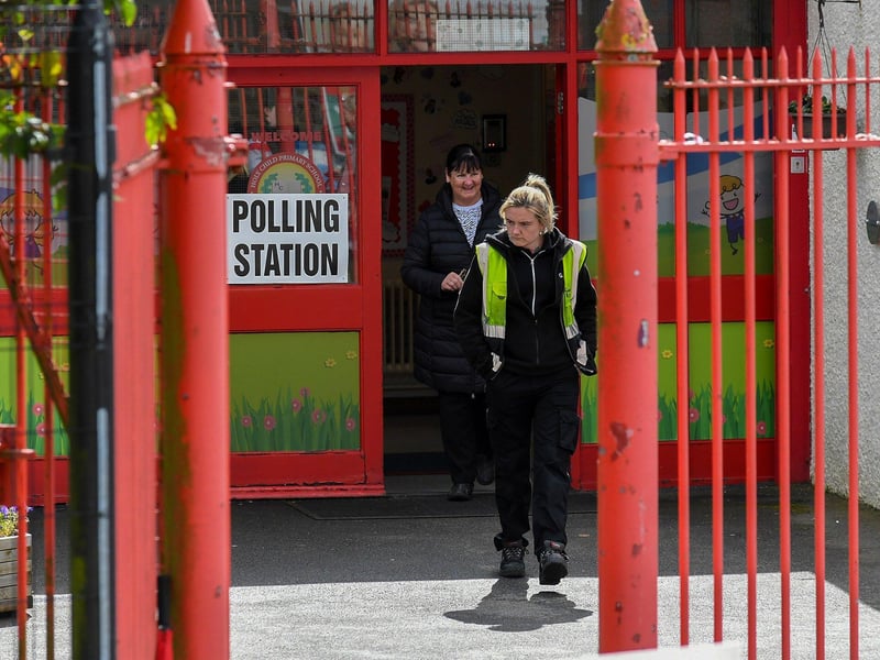 People leave the Holy Child Primary School after voting in the 2024 Westminster general election. Photo: George Sweeney