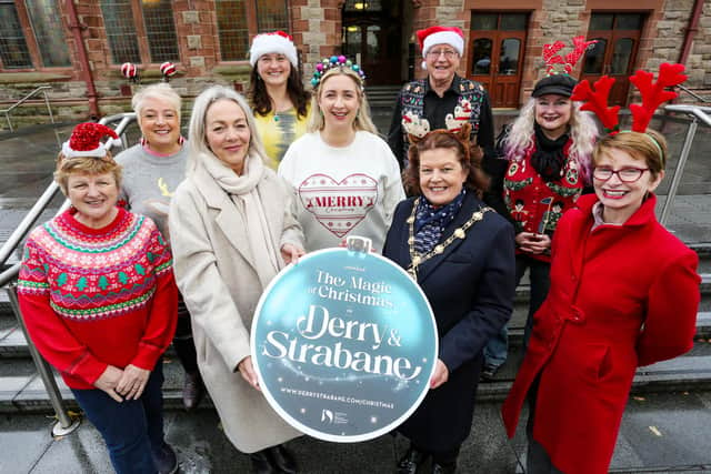 Mayor of Derry City and Strabane District Council, Councillor Patricia Logue, launching Council’s Christmas programme with Council’s Events Co-ordinator Andrea Campbell and members of the Voices of the Foyle Choir. Photo Lorcan Doherty.